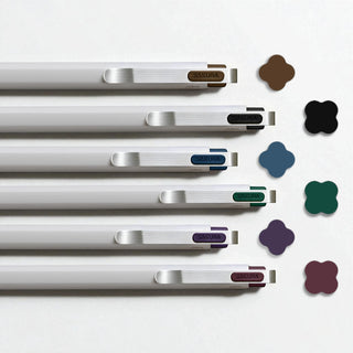 Set of six Ballsign id 0.4 mm ballpoint pen ends laying horizontally with color swatches on a white background - Shibuya Stationery