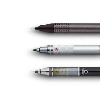 Three Mitsubishi Kuru Toga mechanical pencils of different designs close up on a white background - Shibuya Stationery Store