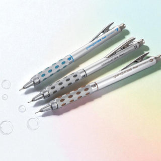 Three Pentel GraphGear 1000 mechanical pencils on a gradient background with lead drawn bubbles - Shibuya Stationery
