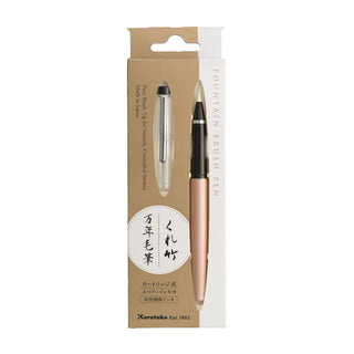 Pink gold Kuretake fountain brush pen in beige and white packaging on a white background - Shibuya Stationery Store