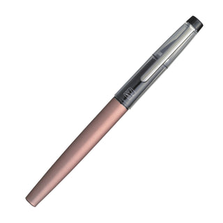Pink gold Kuretake fountain brush pen laying diagonally with clear cap and silver clip on a white background - Shibuya Stationery Store