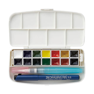 Kuretake mini watercolor paint set open with two brush pens in a white case on a white background - Shibuya Stationery Store