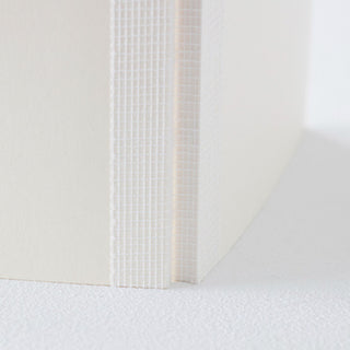 Midori MD Notebook A5 close-up of spine binding with textured grid cloth cover – Shibuya Stationery