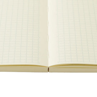 Close up of grid pages in the Midori MD Notebook B6 Slim opened flat – Shibuya Stationery Store