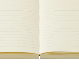 Close up of grid pages in the Midori MD Notebook B6 Slim opened flat – Shibuya Stationery Store