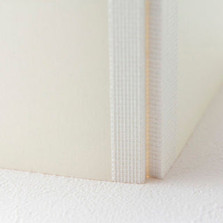 Midori MD Notebook Journal A5 close-up of textured cloth spine – Shibuya Stationery
