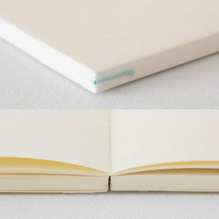 Midori MD Notebook Journal A5 Dot Grid side view showing exposed thread binding – Shibuya Stationery