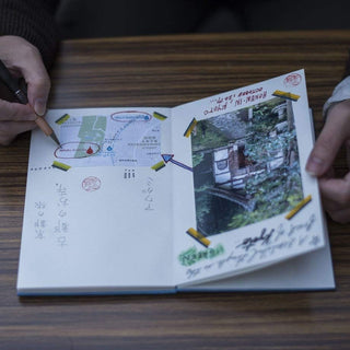 Writing demo of Orihon Indigo-dyed Accordion Goshuin Book Indigo Fade Wash - Shibuya Stationery