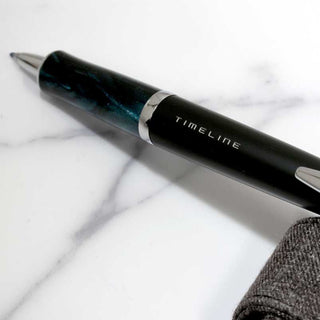 Pilot Timeline Eternal Ballpoint Pen Eternal Green resting on marble surface – Shibuya Stationery