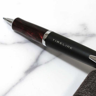 Pilot Timeline Eternal Ballpoint Pen Eternal Red on polished marble desk – Shibuya Stationery