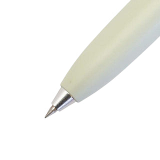 Close-up of the 0.38mm tip on the Uni-ball One 3 multi pen in Grass Green, designed for fine and precise writing.