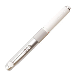 Uni-ball ZENTO Signature Model 3-color ballpoint pen 0.38mm in silver with cap on, shown in full view - Shibuya Stationery Store