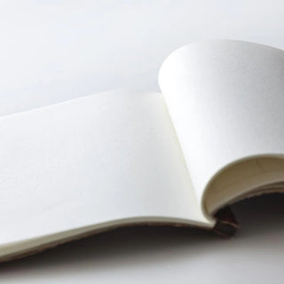 Wacho Kakishibu Persimmon Dyed Notebook open pages shown - Shibuya Stationery