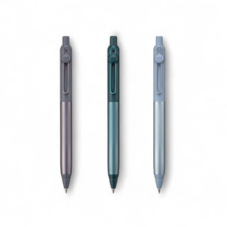 Three Uni Zento flow design pens laying flat in different colors on a white background - Shibuya Stationery Store