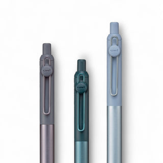 Bundle of three close up of uni Zento Flow ballpoint pens of different colors on a white background - Shibuya Stationery Store