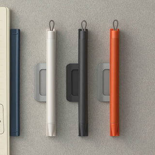 Zebra Pitan Ballpoint Pen Holder for Notebooks 0.5 color lineup on gray desk – Shibuya Stationery