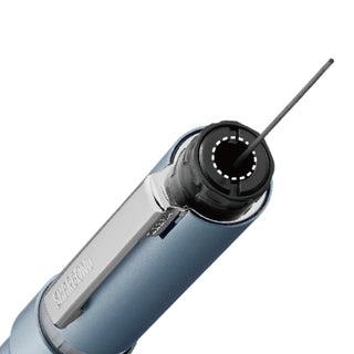 Close up of a Zebra brand Sharbo Nu Multi Pen in blue gray color with lead on a white background - Shibuya Stationery Store